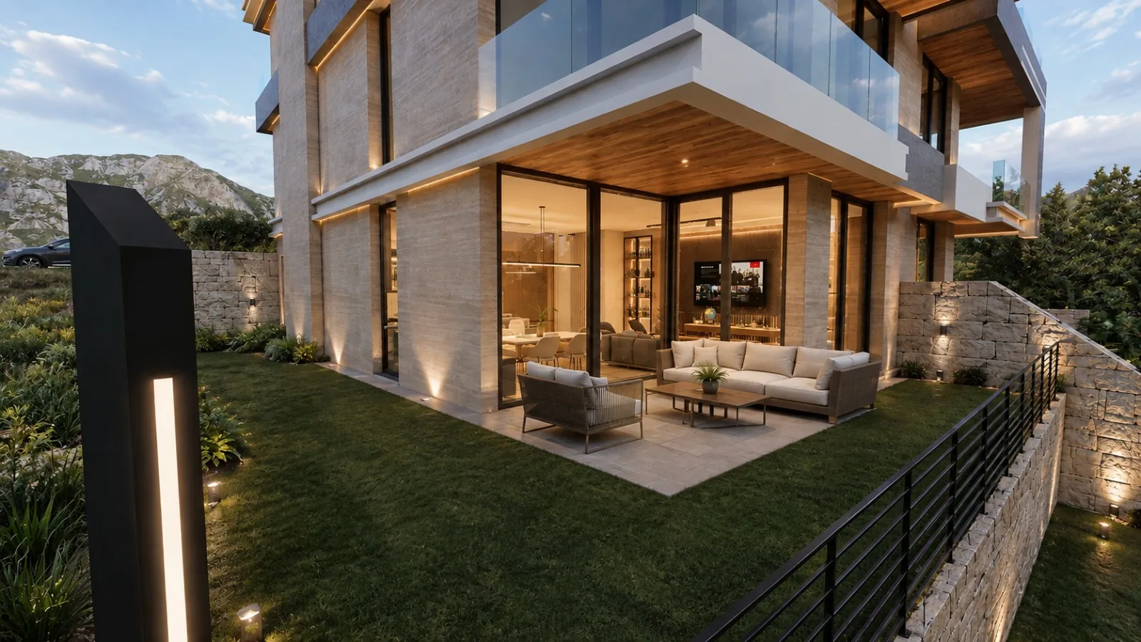 Garden residence with covered terrace opening onto a private lawn